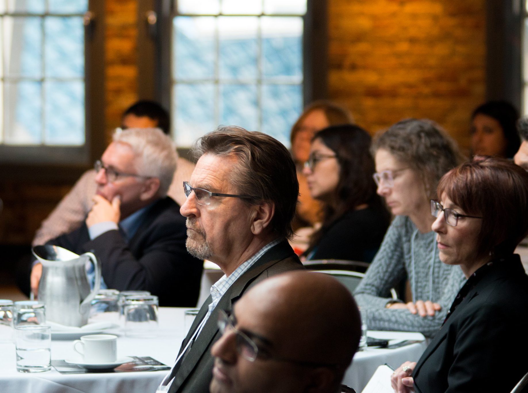 Policy forum attendees listen intently