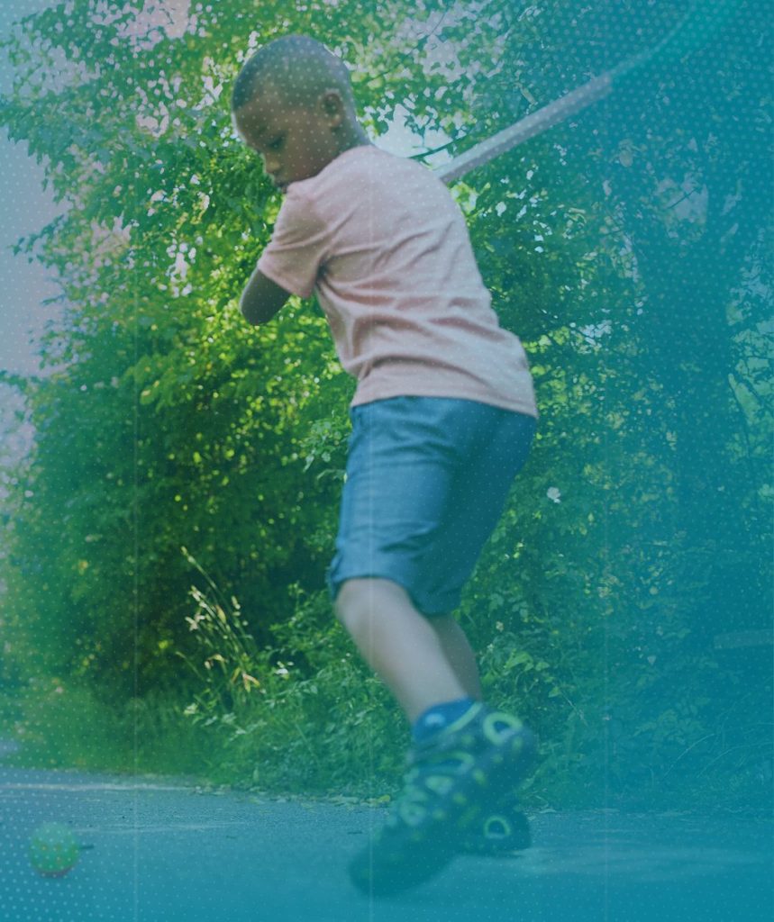 A young boy playing in the #MyLungLife Hockey Challenge